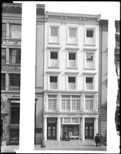 535 5th Avenue. Simcox [Building, women looking at dresses in store window].