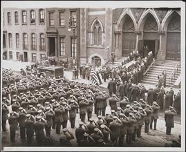 [Firemen saluting at a funeral.]