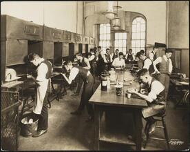 East 8th Street and Third Avenue. Cooper Union. Students at Cooper Union working in lab