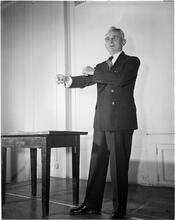 Dale Carnegie [Dale Carnegie teaching a class on public speaking.]