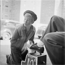 Shoe Shine Boy [Mickey shining shoes.]