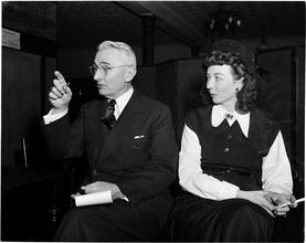 Dale Carnegie [Mrs. Dale Carnegie watches her husband criticize students.]