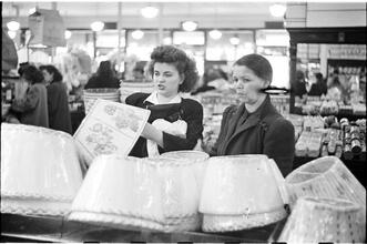 Woolworth's Store [Women looking at lampshades in Woolworth's.]