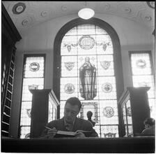 Columbia University [Student in the library.]