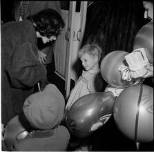 United Nations Children's Party [Child talking to a woman wearing a costume.]