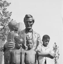 Harlem ["Abraham Lincoln with a child" bronze sculpture by Charles Keck in the Lincoln Houses complex.]
