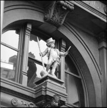 ["Puck" statue over Lafayette Street entrance to the Puck Building.]