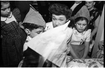 Deaf Children [Children eating cake at a party.]