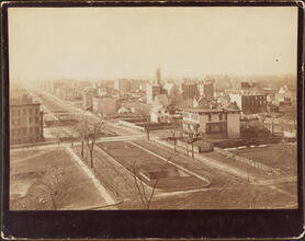 [View from the roof of George Ehret's home at Park Avenue and 94th Street.] Looking west. Shows the Metropolitan Museum of Art [and Cleopatra's Needle] and the 86th Street Station of Harlem Division o