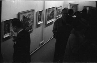 [Social gathering at art gallery.]