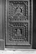 [Detail of bronze door with transportation motif, 20 Exchange Place.]