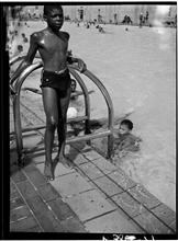 Boy Standing by Colonial Park Pool.