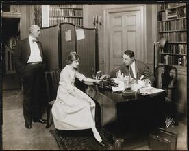 [John W. Cope as James Crocket, Jeanne Eagels as Ruth Atkins, and Bruce McRae as Robert Audrey in "Daddies".]