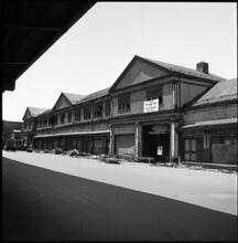 [Delapidated buildings on the Hudson River waterfront.]
