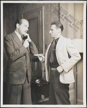 [James Todd as Dr. William A. Shelby and Roy Hargrave as Hal Wilson in "Blind Alley".]