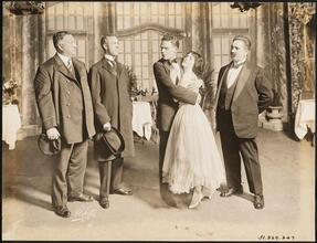 ["The Man Who Came Back" theater still.]