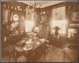 [Residence. Interior, parlor.]