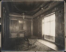 [Interior, room with table, toward window.]