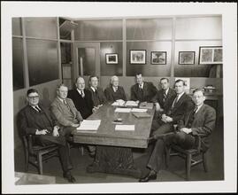For 34 Years of Loyal Service - Eric S. Barron [Eric Barron and other men at a conference table.]