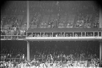 Football Writers [Fans in the stadium.]