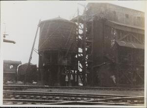 [Water tower and railroad tracks.]
