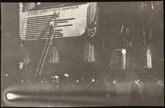 Street Scenes, etc. Showing Displays of Liberty Loan Posters during World War I [Liberty Loan billboard.]