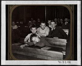 Night school in the west side lodging house. Edward, the little pedlar, caught napping.