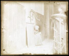 Baby in slum tenement, dark stairs--it's playground.