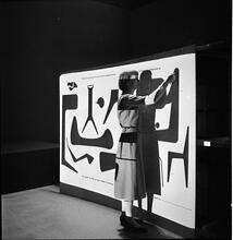 Museum of Modern Art [Staff members and art installations.]