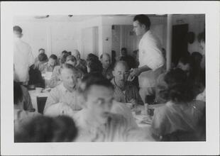 [People dining in cafeteria of vessel.]
