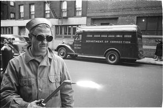 Paddy Wagon [Man with welding equipment used in the making of the television show Paddy Wagon.]