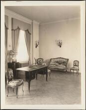 [Interior, possibly an office.]