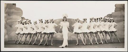["Boys and Girls Together" theater still.]
