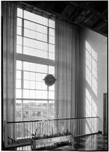 Rex Cole [Building]. Detail of large window.
