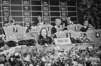 Milton Berle - Damon Runyon Cancer Fund [Milton Berle with a young girl at the telethon.]