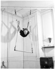 Fashion Models: Lisa Fonssagrives [Meg Mundy on a trapeze.]