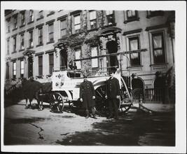 [Horse-drawn fire engine.]
