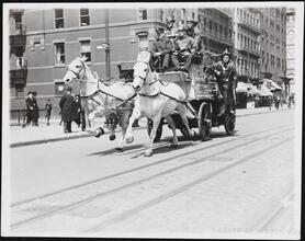 [Horse-drawn fire engine.]