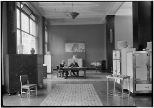 Rex Cole [Building]. Salesroom down entrance aisle.
