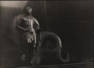 [Statue.]