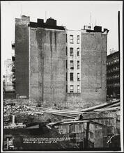 View looking north west at east gable wall to 320 71st Street, New York City