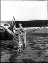 Fashion Models: Lisa Fonssagrives [Lisa Fonssagrives next to an airplane.]