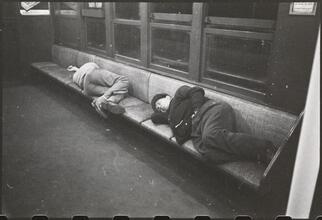 Life and Love on the New York City Subway [Men sleeping in a subway car.]