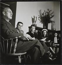 Columbia University [Professor with students in an office.]