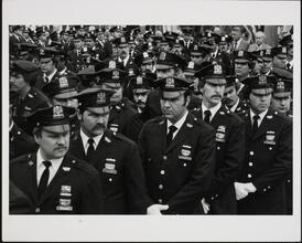 Funeral for an officer killed in the line of duty.; Police Work