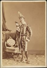 [August Belmont, Jr. in costume for a fancy dress ball.]