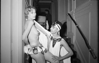 Art Students League Ball [Man looking at a costumed woman.]