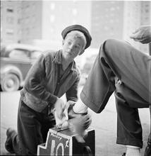 Shoe Shine Boy [Mickey shining shoes.]