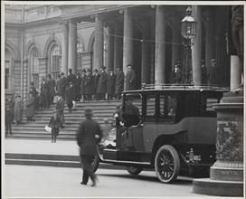 Men on the steps of City Hall]