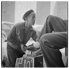 Shoe Shine Boy [Mickey shining shoes.]